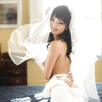 Sexy Asian bride Marica Hase removing wedding dress for nude photo spread