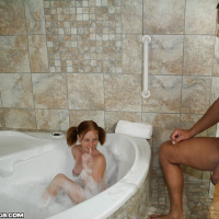 Pregnant Alyssa Hart gives a slippery bath handjob