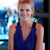 Brooklyn Decker showing big cleavage in blue mini dress at PlayStation booth at