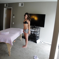 Latina Gigi Rivera stripping off shorts before getting naked on massage table