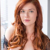 Redheaded babe Mia Sollis flaunting perky teen boobs for glamour photos