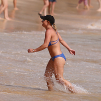 Britney Spears booty wearing skimpy blue bikini at the beach in Hawaii