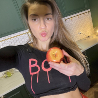 Pretty chick Melena Maria Rya taking selfies of herself with an apple