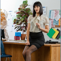 Office slut Bobbi Starr strips to stockings to pose on her desk