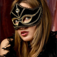 Sweet Lilya wearing a Mask showing her small Boobs