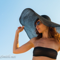 Sweet chick Jeny Smith posing in a black bikini outdoors