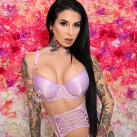Hot alt babe Joanna Angel strips lingerie and reveals sexy inked body