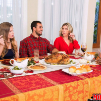 Cory Chase and Sydney Cole share a meat pole on Thanksgiving