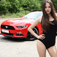 Brunette teen Li Moon spreads her legs in a Mustang