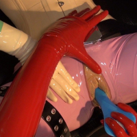 Horny Latex Lara getting pleased with toys by two friends