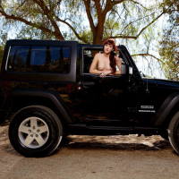 Redhead beauty Ellena Woods strips nude next to her jeep