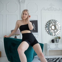 A pretty blonde Nikki Hill demonstrates her seductive body