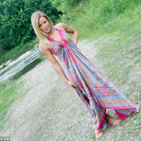 Beautiful blonde Meet Madden getting naked by a creek