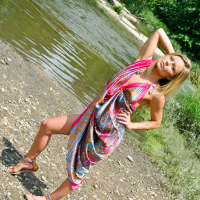 Beautiful blonde Meet Madden getting naked by a creek