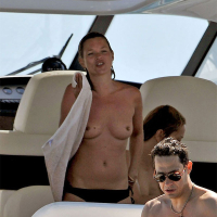 Kate Moss showing great topless on a boat