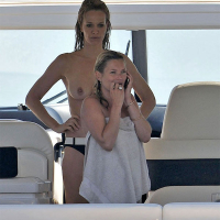 Kate Moss showing great topless on a boat