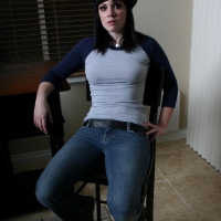 Dexey Paige shows off her delicious little ass as she pulls down her tight jeans