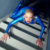 beautiful tall goddess in blue latex with zip up pussy flap
