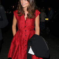 Jenna Louise Coleman wearing red hot polka dot dress at the Charlie And The Choc