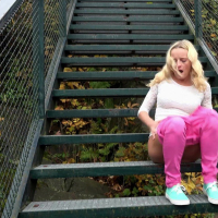 Amy Pink in tight pink pants taking a leak