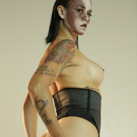 Dana Vespoli looks sexy Topless in black Corset