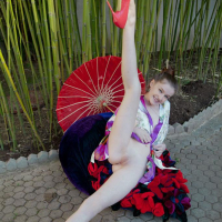 Brunette teen Emily Bloom strips naked for you outside in Nizaco