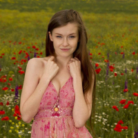Brunette teen Emily Bloom displays her pretty nude body outside in Grimas