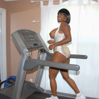 Lovesome black MILF Stacy Adams exposing huge tits in the gym