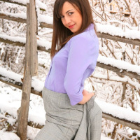Emma H looking stunning in the snow in her sexy secretary outfit