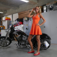 Blonde Jenny Smart strips on a Motorcycle
