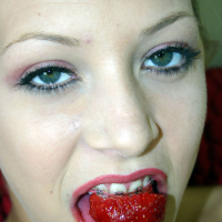 Petite blond Leah Luv gets nasty with strawberries