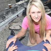 Lilly Banks gives a hot pov blowjob on the roof outside