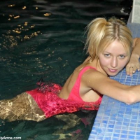 Lovely Anne swimming in the pool