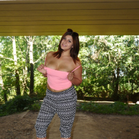 Curvy July Johnson shows her Body outdoors