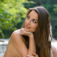Beautiful brunette Lorena Garcia naked next to a River