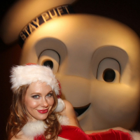 Maitland Ward cleavy and leggy licking a giant lollipop in Santas costume