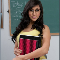 Busty brunette coed in glasses Valerie Kay stripping in the class