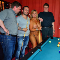 Nude babe Chrissy plays a sexy game of billiards and shows off her big tits
