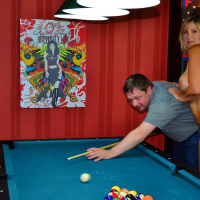 Nude babe Chrissy plays a sexy game of billiards and shows off her big tits