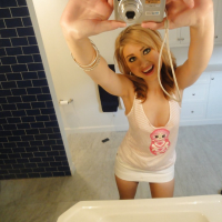 Blonde babe Molly Bennett does sexy selfshots in the bathroom
