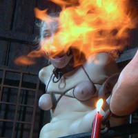 Delirious Hunter metal bound with bdsm toys and fire her bare feet spanked