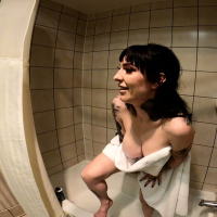Misha Montana shaving her pierced pussy in a bathtub