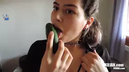 Mikdina sucking cucumber