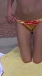 catches stripteasing chick