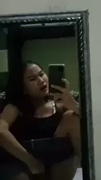 Karisma in front of mirror