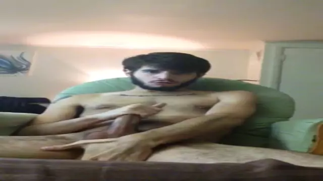 young Caucasian guy masturbating