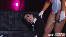 Rebecca the ventriloquist plays with the dummys wood