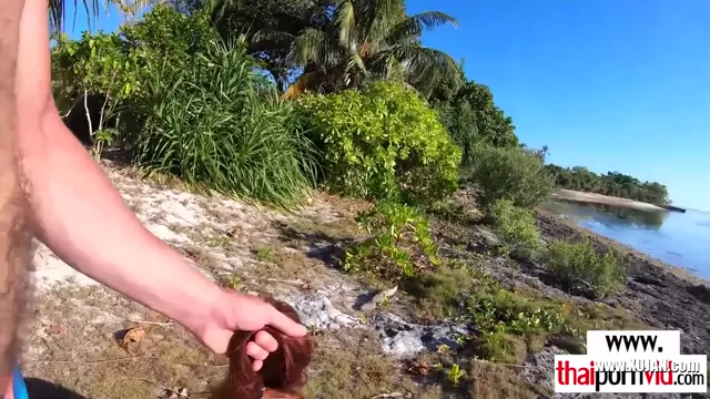 Adorable amateur Thai teen Cherry has to fuck a big white dick at the beach