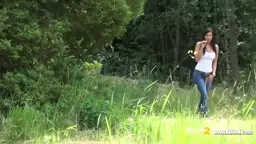 Squatting To Pee Brunette Rebecca pulls down her denims to piss
