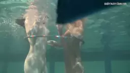 Russian lesbos swimming in the pool